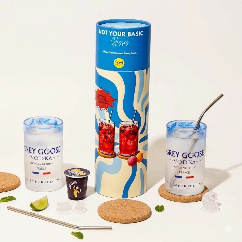 Two Grey Goose vodka glasses with a decorative box on a white background