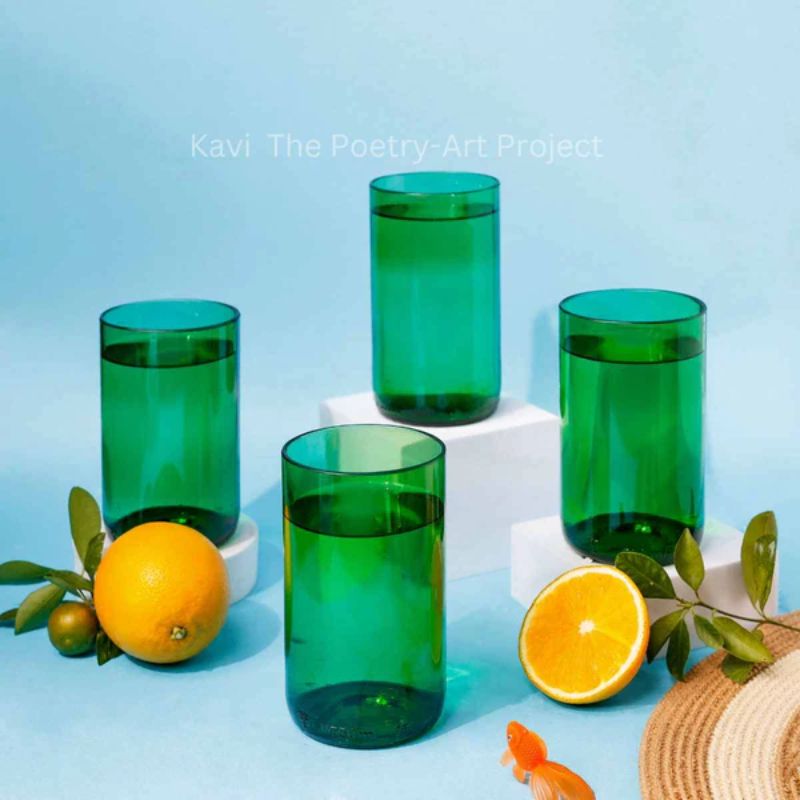 Set of green upcycled wine bottle glasses from Kavi The Poetry-Art Project, eco-friendly drinkware in a stylish design