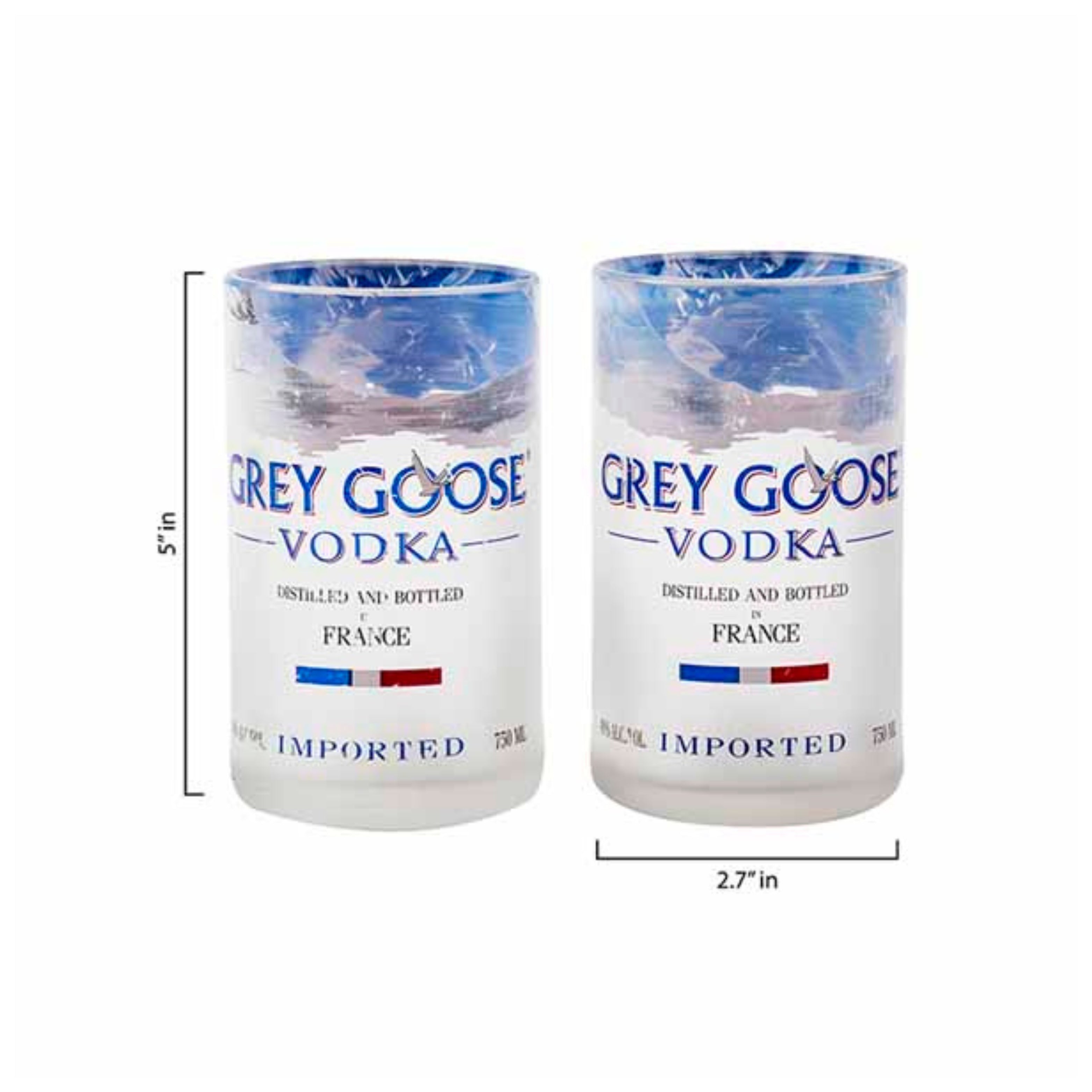 Two Grey Goose Vodka shot glasses with measurements on a white background