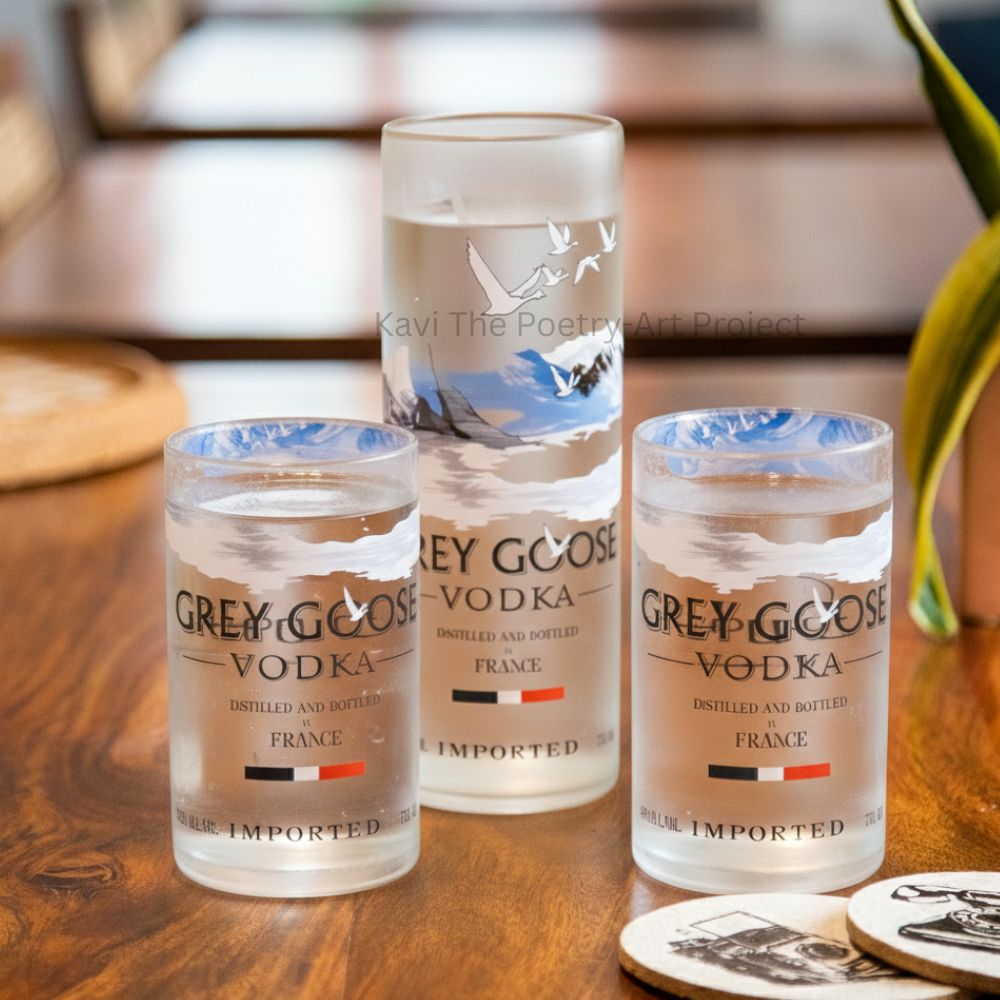 Set of three Kavi Upcycled Grey Goose Big Glass drinkware featuring artistic grey goose design, perfect for stylish beverages.